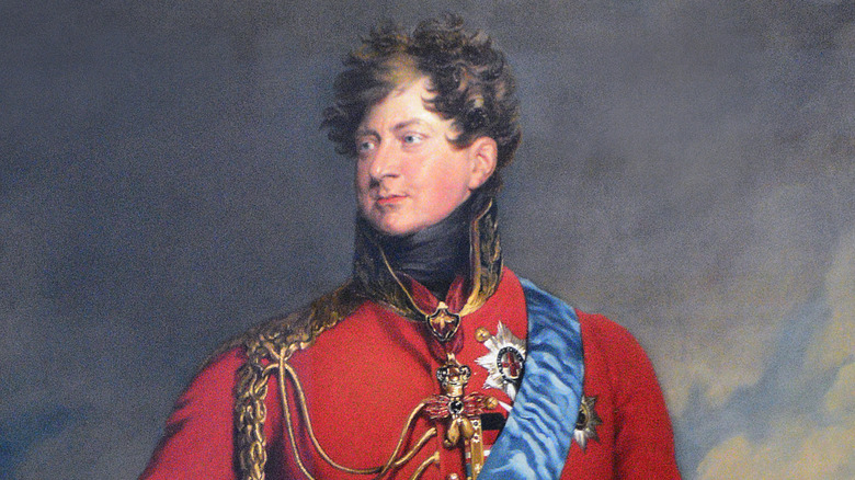 A painted portrait of George IV in a sash 