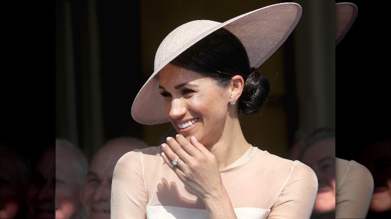 Meghan Markle laughing at appearance