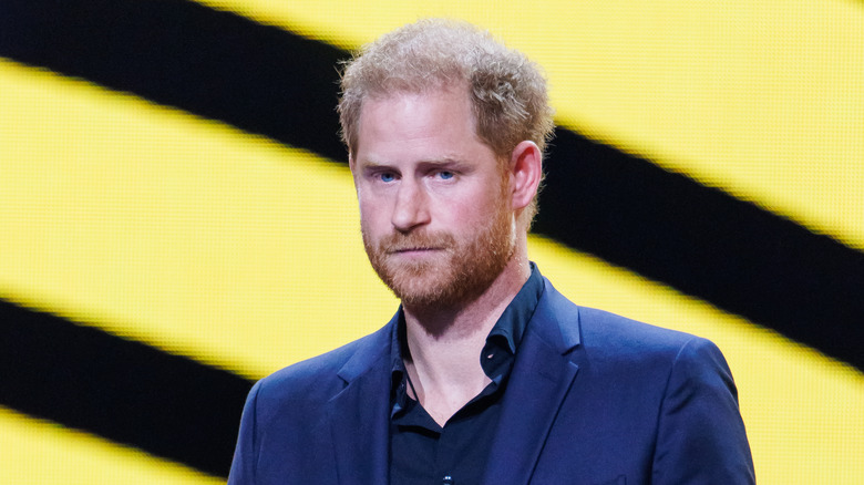 Prince Harry speaking on stage