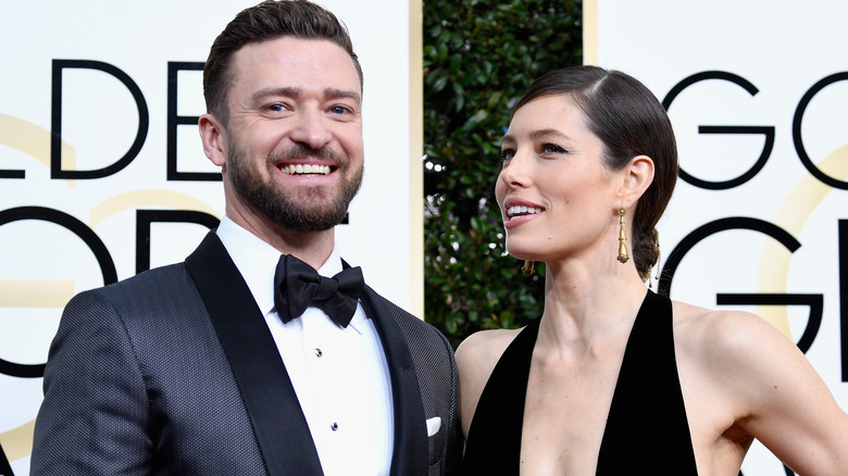 Jessica Biel talks to smiling Justin Timberlake