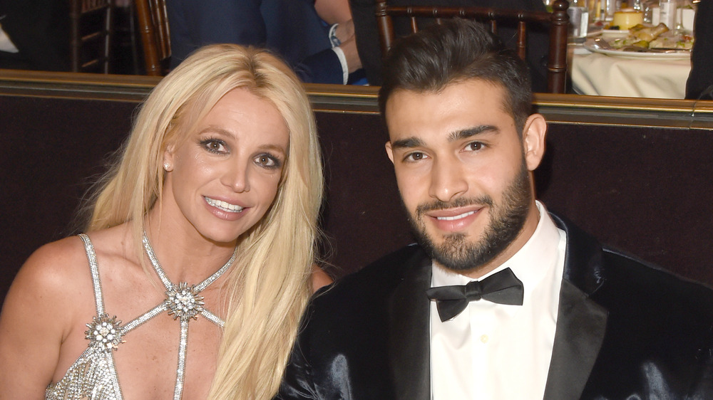 Britney Spears and Sam Asghari smiling