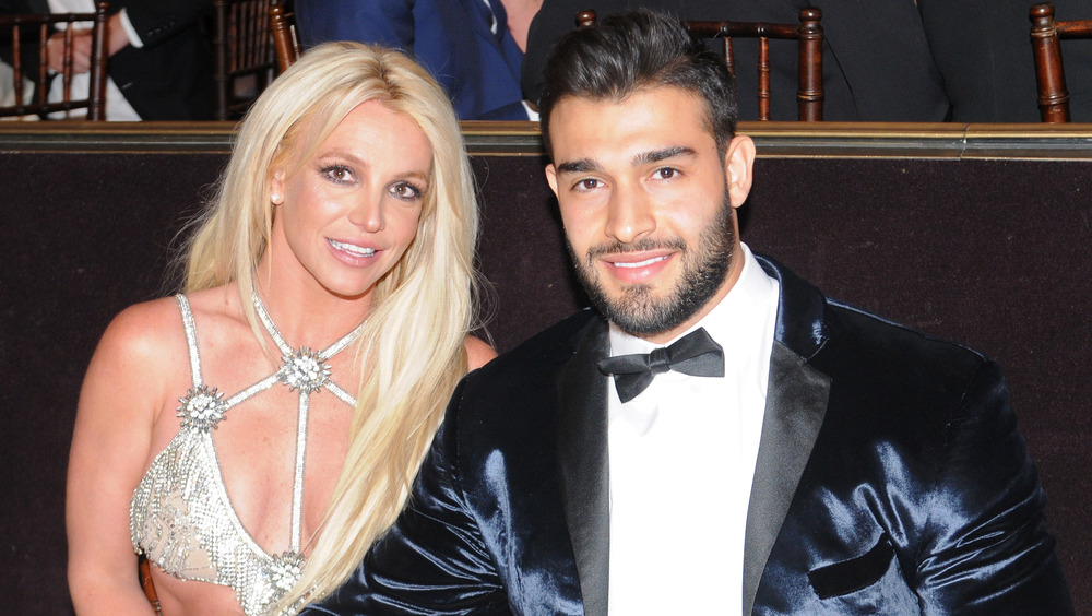 Britney Spears and Sam Asghari at a formal dinner