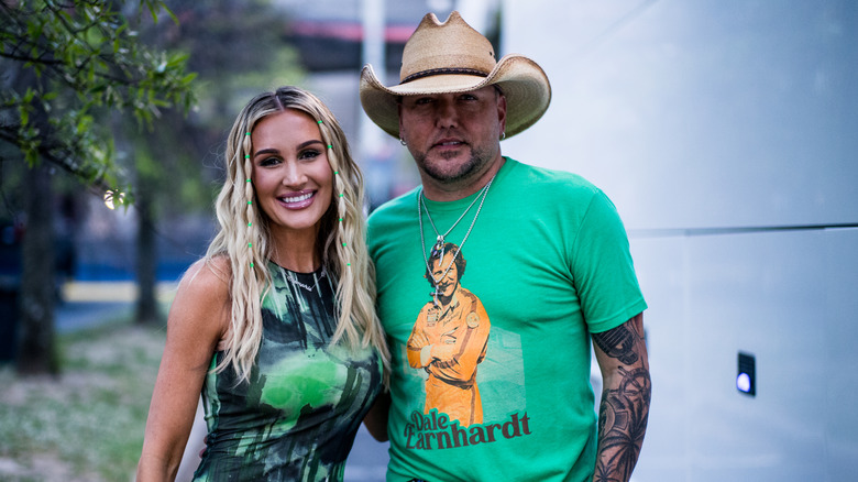 Brittany Kerr Aldean posing with Jason Aldean