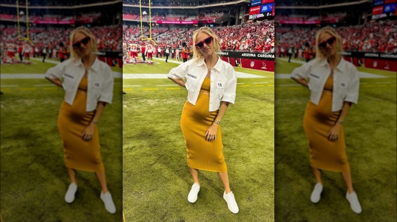 Brittany Mahomes posing on sidelines