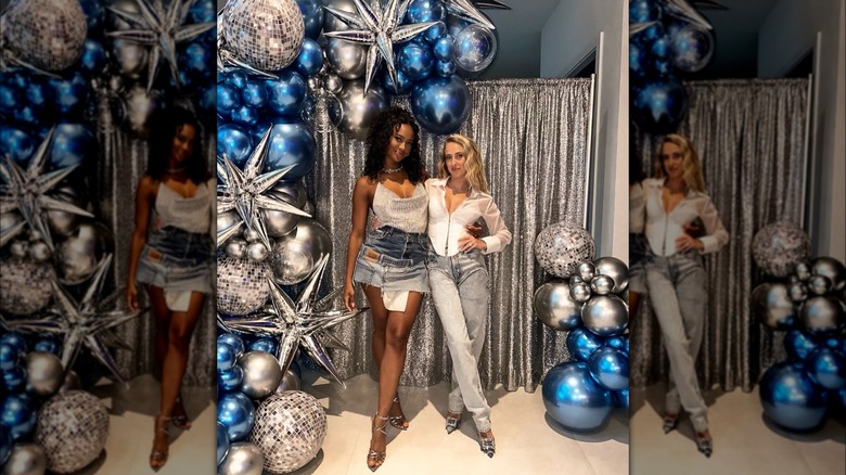 Kayla Nicole and Brittany Mahomes posing together at a birthday party