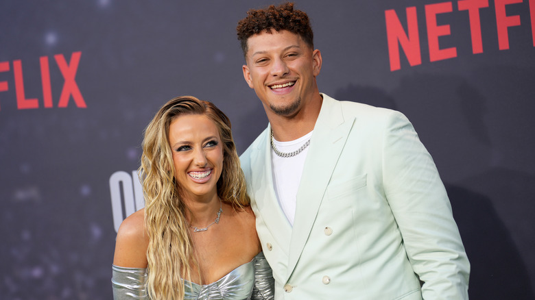 Brittany Mahomes and Patrick Mahomes smiling