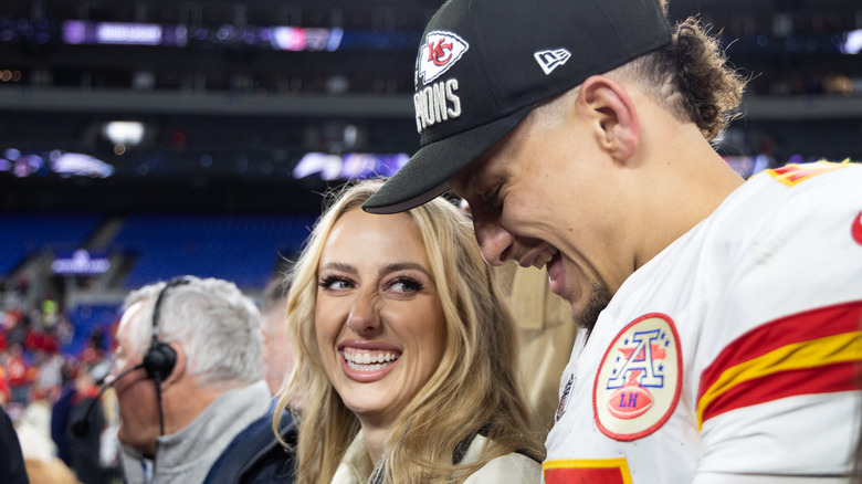 Brittany Mahomes laughing with Patrick Mahomes