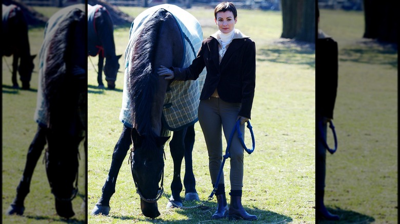 Bronwen Booth standing next to horse