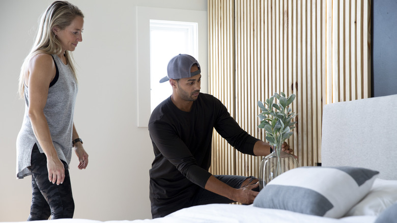 Brooke and Brice Gilliam finishing a bedroom