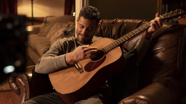 Brandon Quinn playing guitar