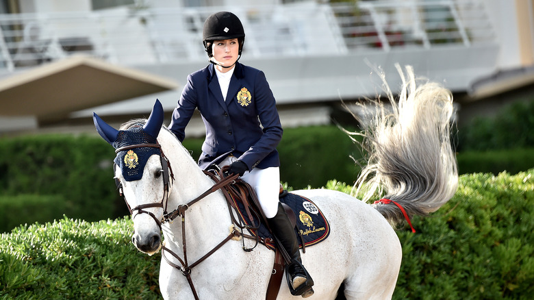 Jessica Springsteen competes in a showjumping event