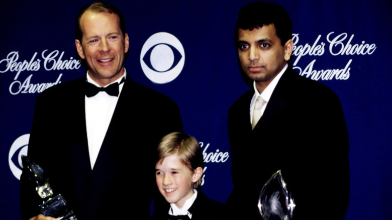 Bruce WIllis, Haley Joel Osment, and M. Night Shyamalan