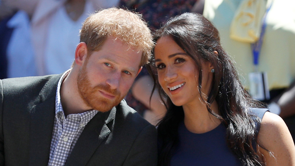 Prince Harry and Meghan Markle talking