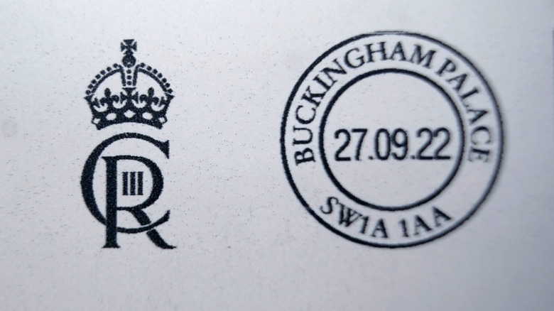 King Charles III's royal cypher stamped on letter from Buckingham Palace