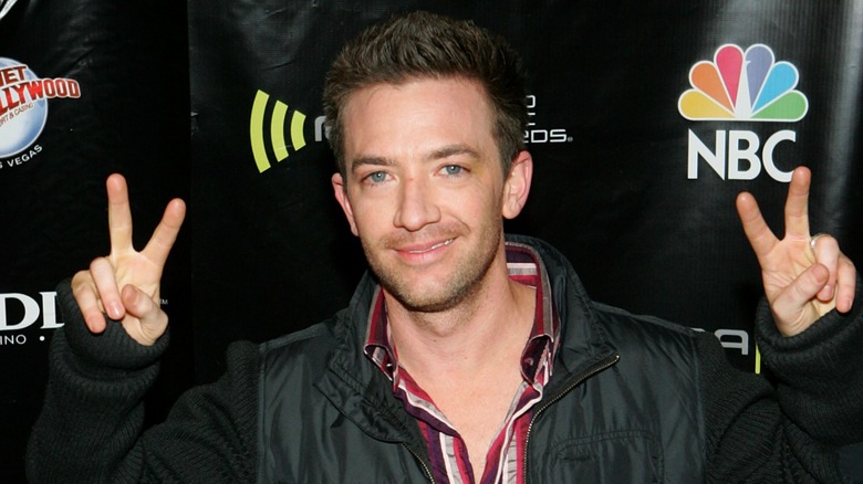 David Faustino double peace signs