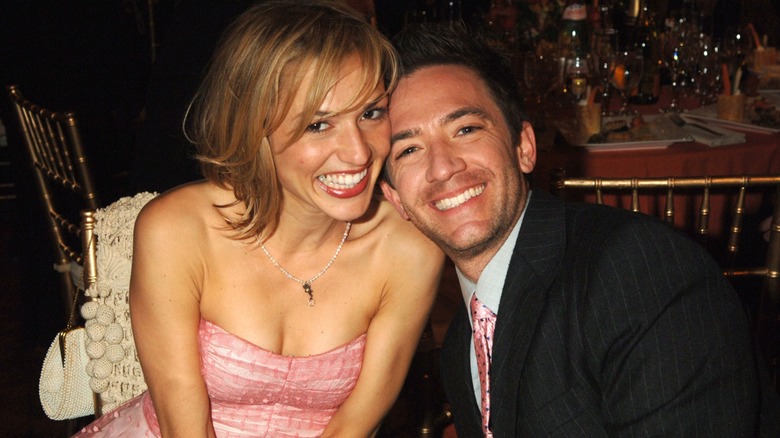 Andrea Elmer and David Faustino smiling together