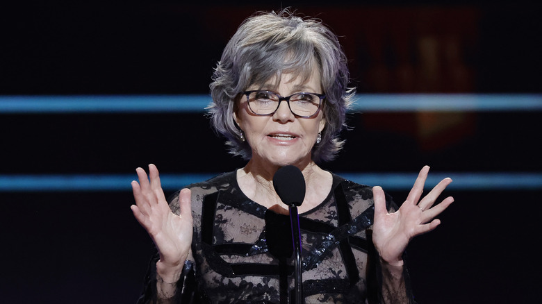 Sally Field talking and gesturing with her hands