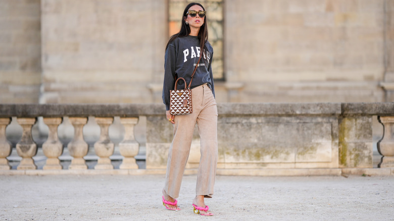 woman wearing sweatshirt casual pants