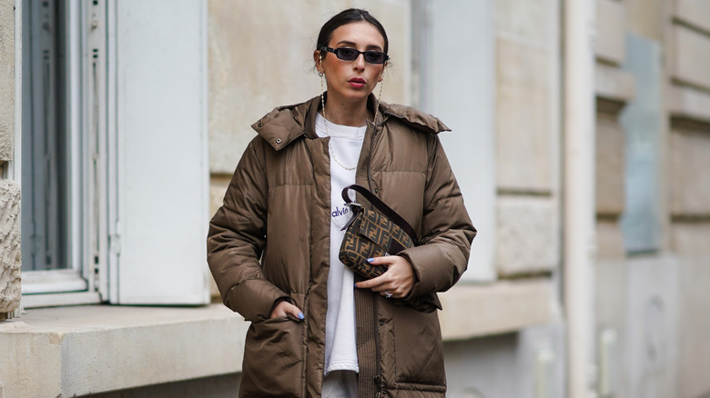 woman wearing brown puff jacket