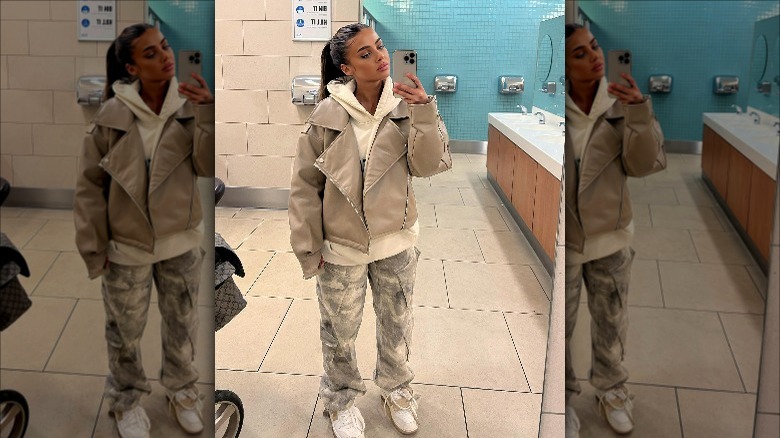 army cargo pants and sweatshirt outfit