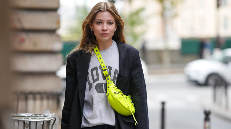 college sweatshirt with belt bag style