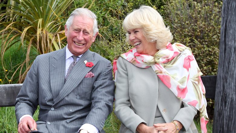 Camilla Parker Bowles and King Charles III smiling 