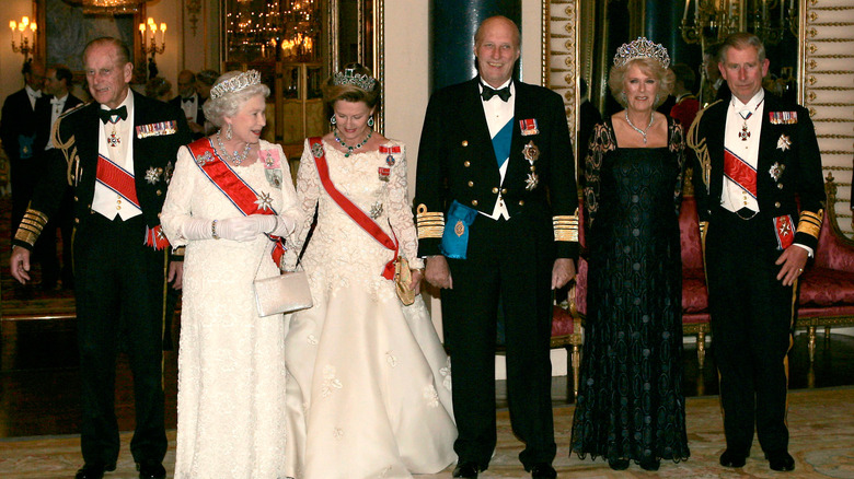 Camilla, Queen Consort posing with the royal family 