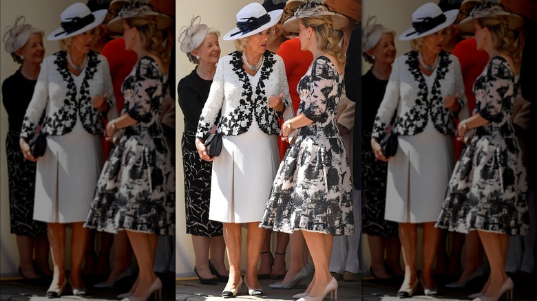 Camilla, Queen Consort speaks in white ensemble