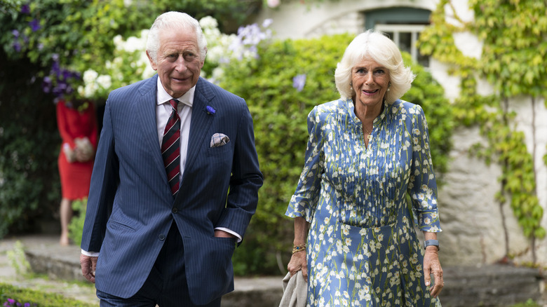 Prince Charles & Camilla Parker Bowles walking