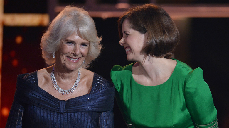 Camilla Parker Bowles presents onstage at the Olivier Awards