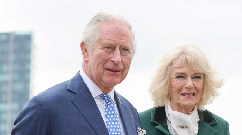 Charles, Camilla posing outdoors