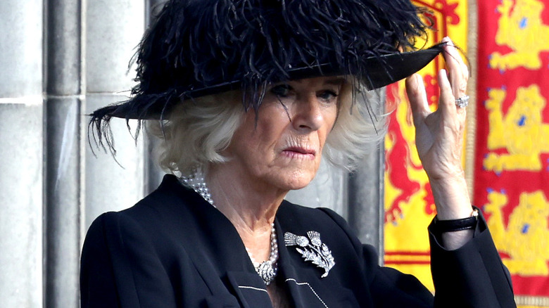 Camilla Parker Bowles honors Queen Elizabeth in Edinburgh.