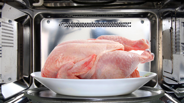 Defrosting chicken in microwave