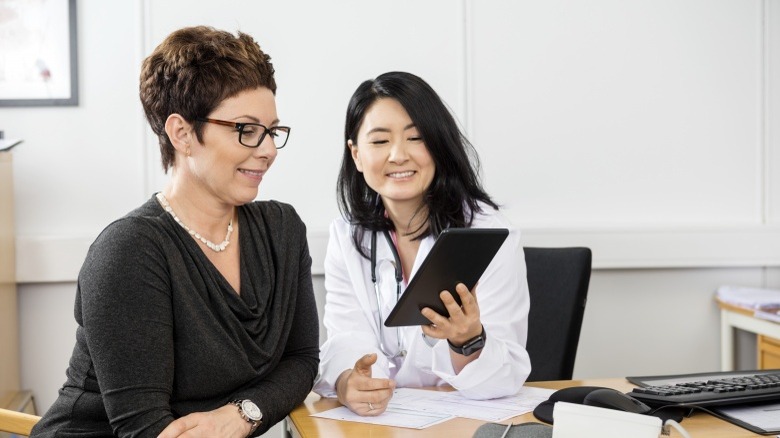 woman talking to doctor