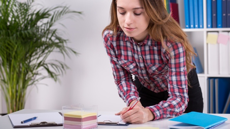 woman planning making notes