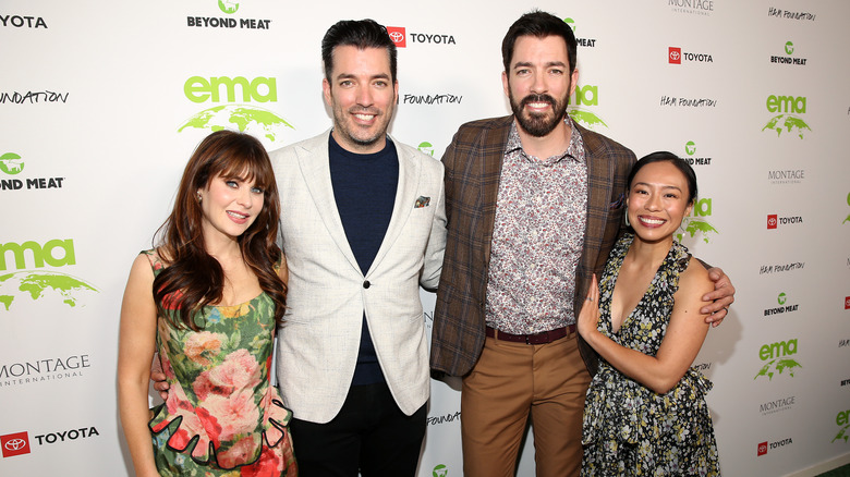 Zooey Deschanel, Jonathan Scott, Drew Scott, and Linda Phan posing together