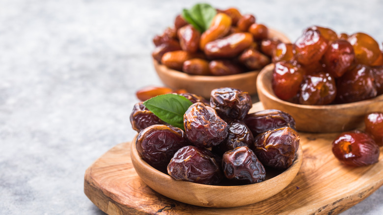 An assortment of dates and nuts on a table