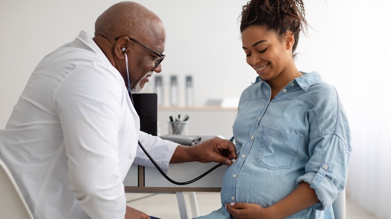 Pregnant woman at doctor