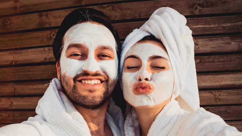 happy couple in face mask