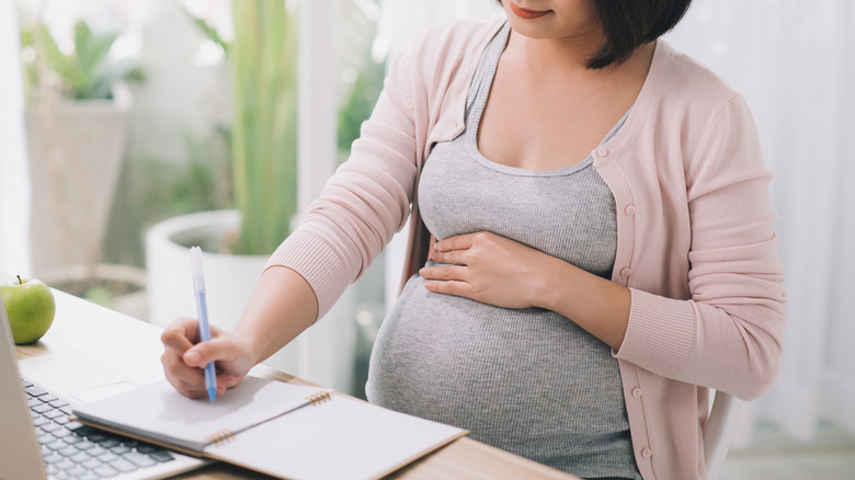 Pregnant woman sitting