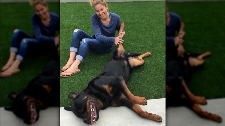 Candace Cameron Bure playing with her dog, Boris