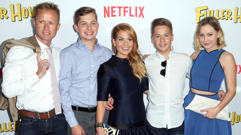 Valeri Bure, Maksim Bure, Candace Cameron Bure, Lev Bure, and Natasha Bure posing