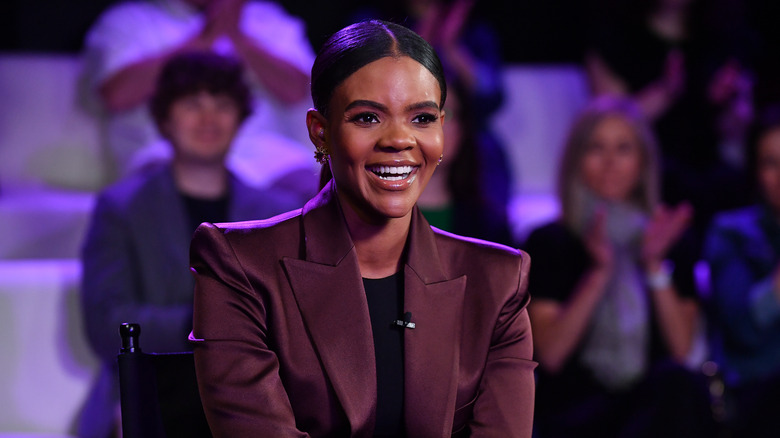 Candace Owens smiling on stage