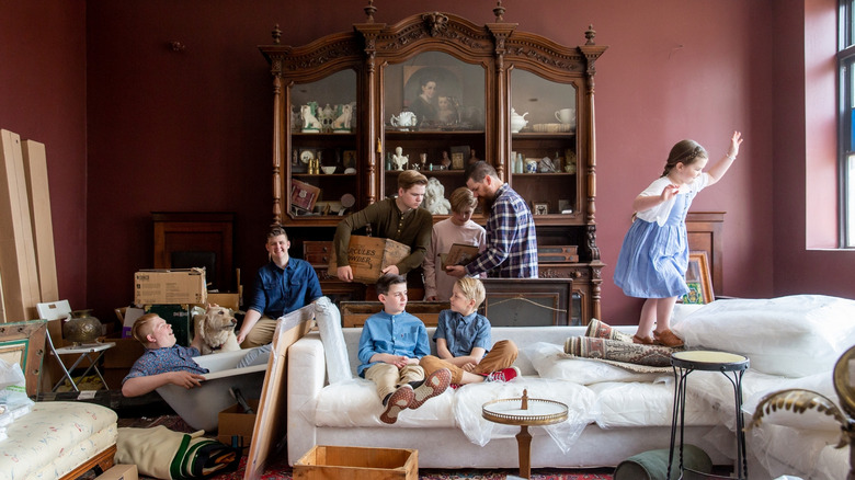 The Meredith family working on their home