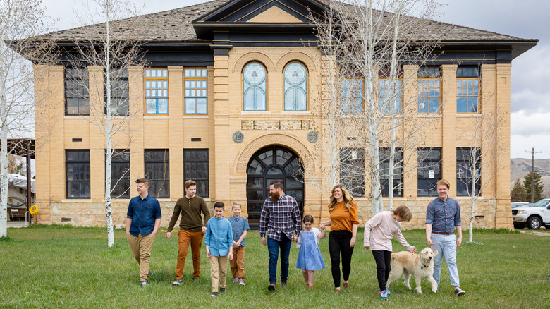 Meredith family in front of schoolhouse