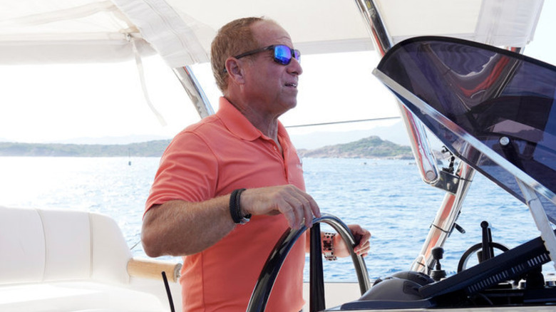 Captain Glenn steering boat