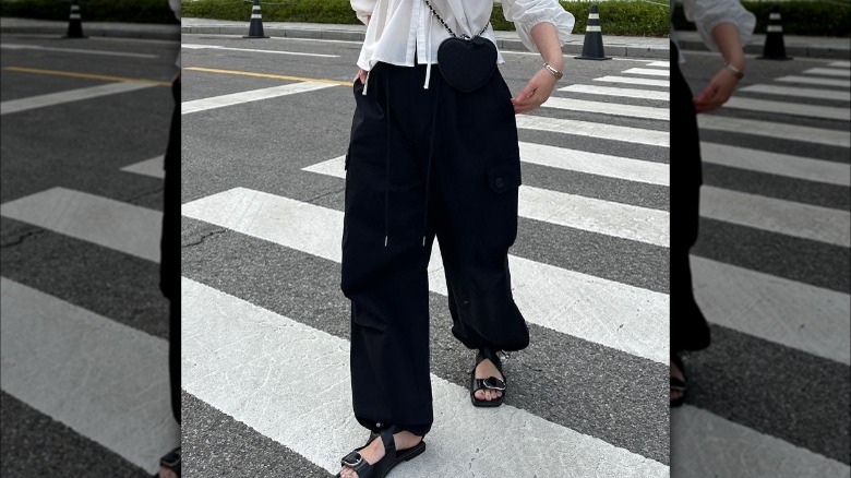 Woman wearing cargo pants and sandals