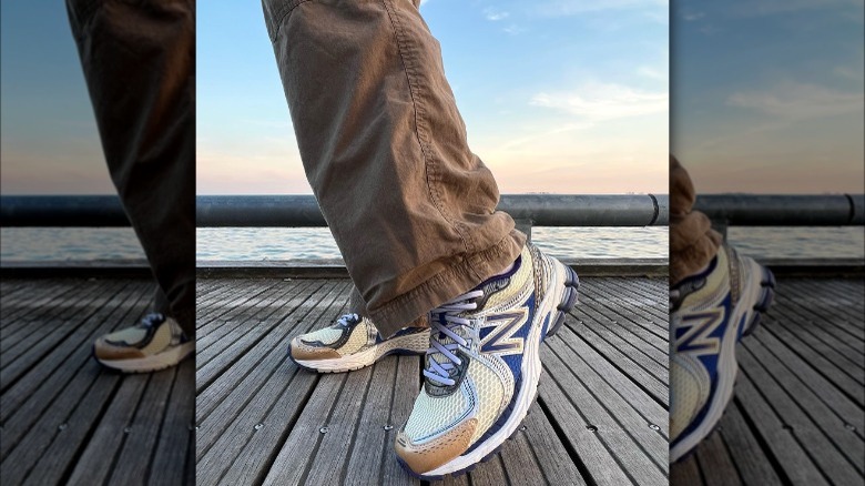 Woman wearing cargo pants and New Balance sneakers