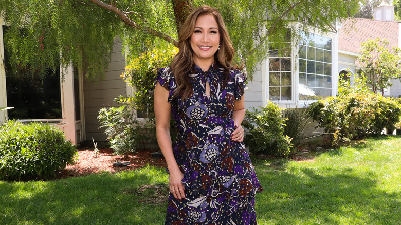 Carrie Ann Inaba posing outside