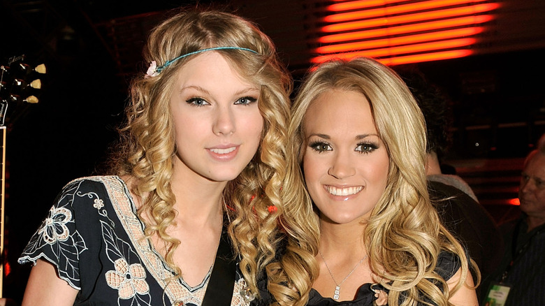 Taylor Swift and Carrie Underwood pose for a photo